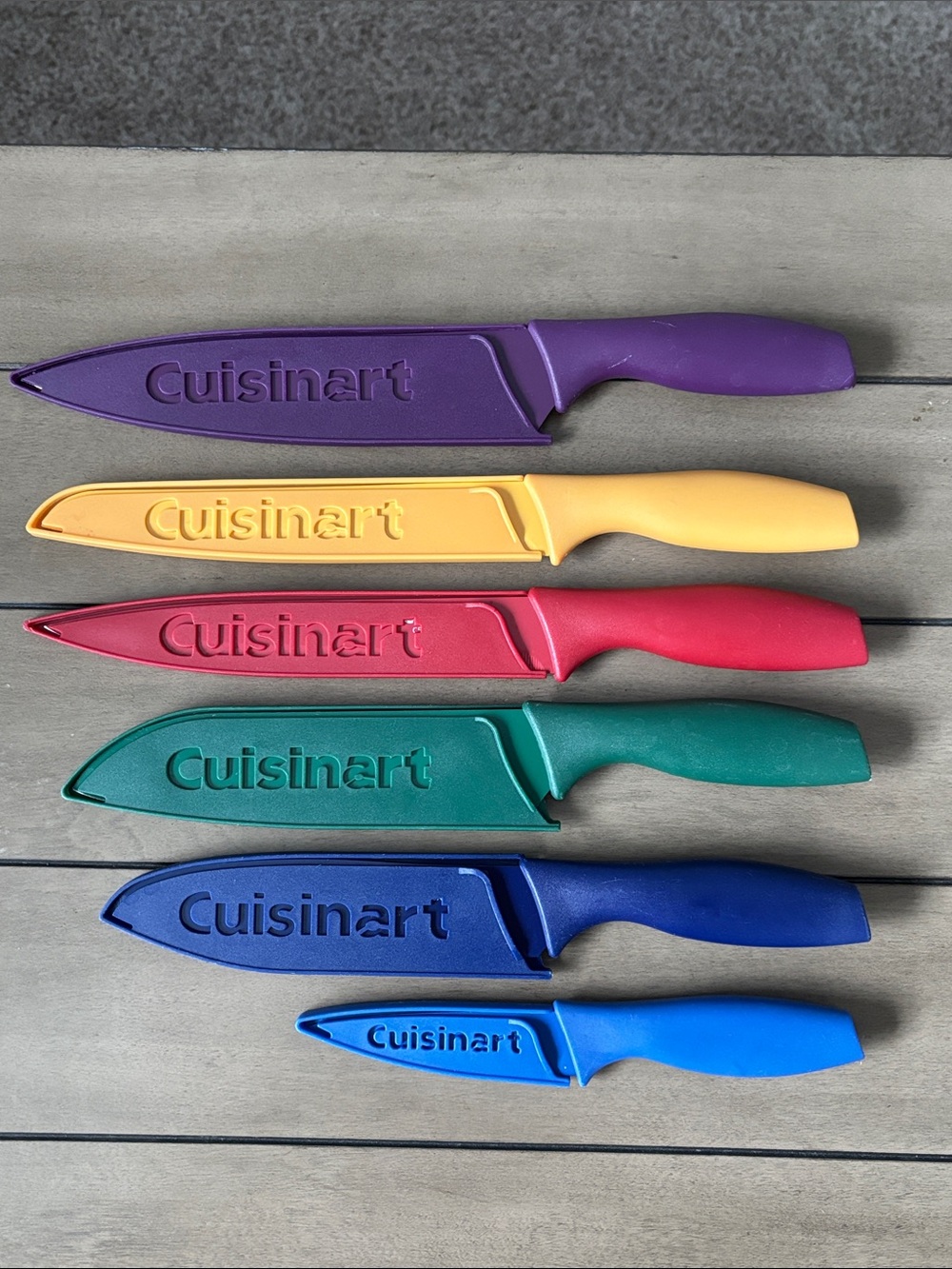 236. Cuisinart 6 piece knife set with knife covers all in beautiful colors